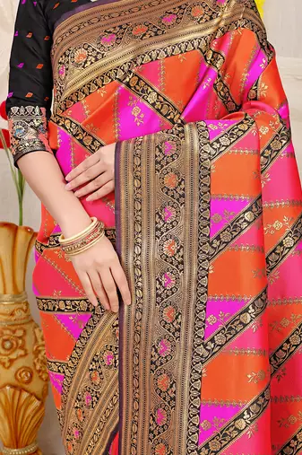 Rani pink and orange patola silk blend saree with black zari border