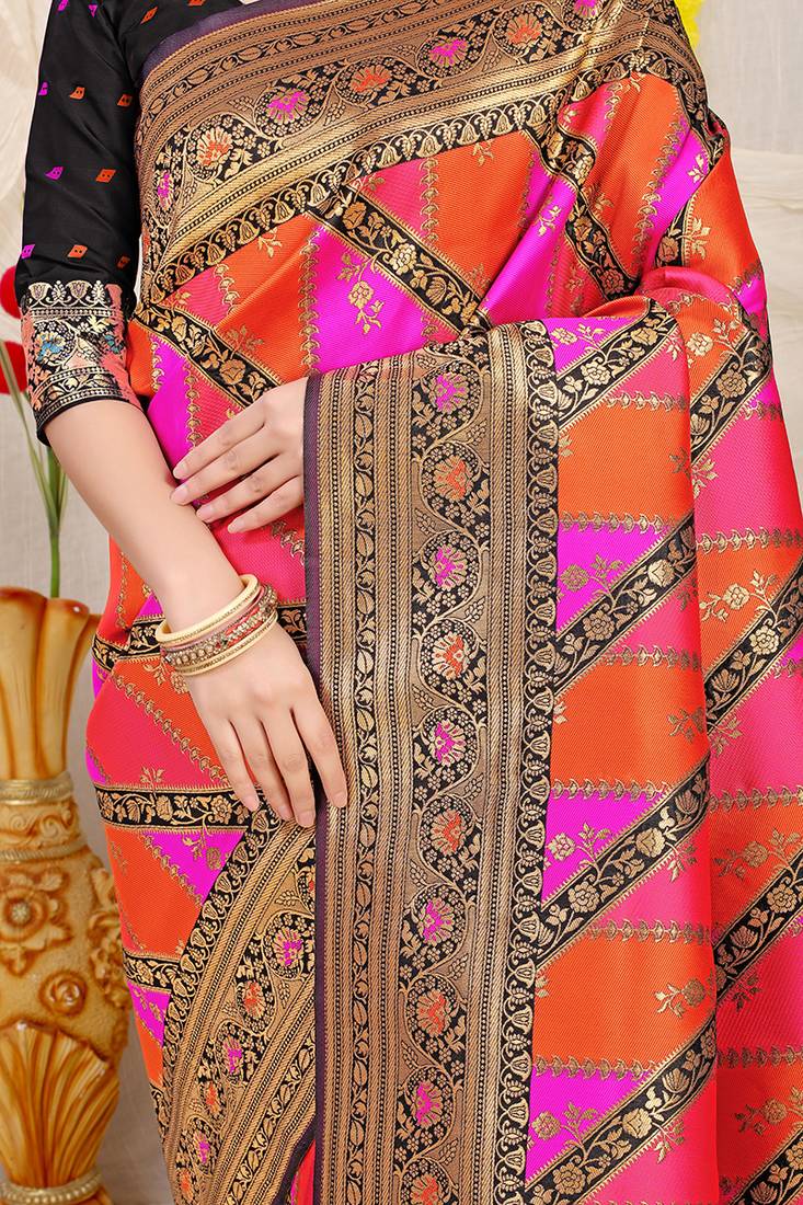 Rani pink and orange patola silk blend saree with black zari border