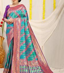 Aqua blue and teal green patola silk blend saree with purple zari border
