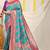 Aqua blue and teal green patola silk blend saree with purple zari border