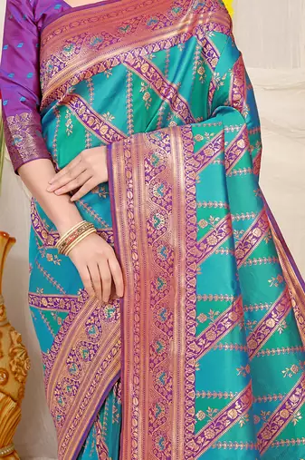 Aqua blue and teal green patola silk blend saree with purple zari border