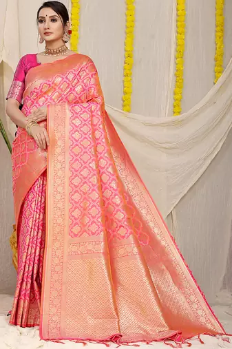 Rani pink woven banarasi silk blend saree with blouse piece