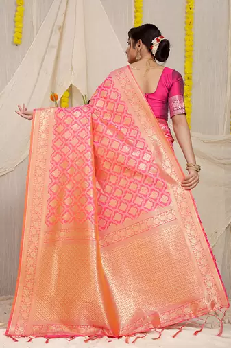 Rani pink woven banarasi silk blend saree with blouse piece
