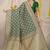 Dark green woven banarasi silk blend saree with blouse piece