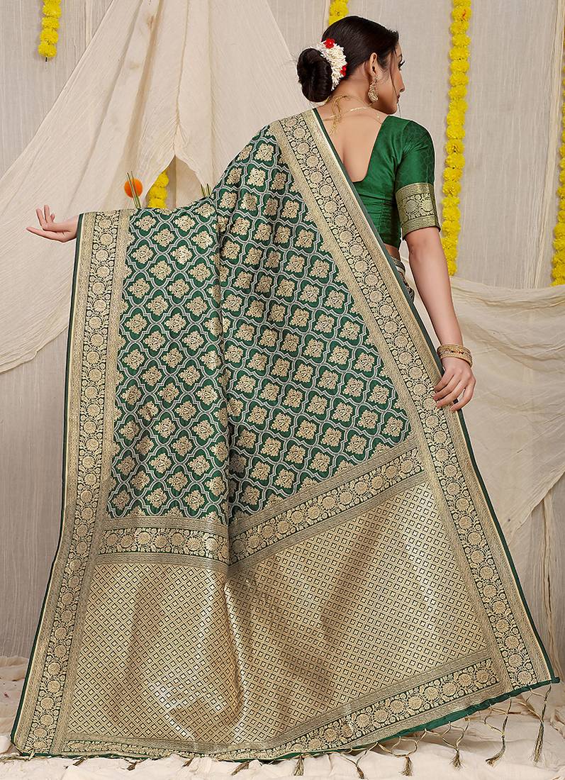 Dark green woven banarasi silk blend saree with blouse piece
