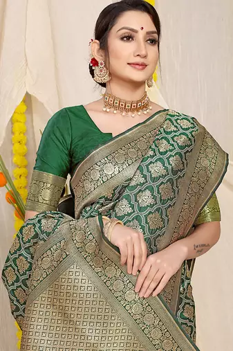 Dark green woven banarasi silk blend saree with blouse piece