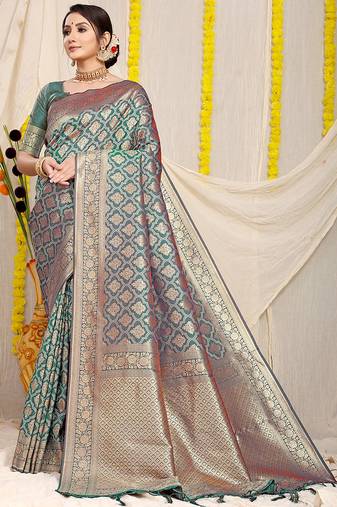 Teal green woven banarasi silk blend saree with blouse piece