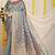 Teal green woven banarasi silk blend saree with blouse piece