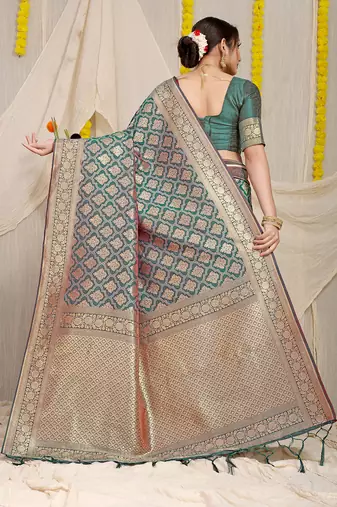 Teal green woven banarasi silk blend saree with blouse piece