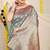 Teal green woven banarasi silk blend saree with blouse piece