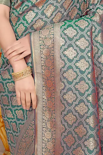 Teal green woven banarasi silk blend saree with blouse piece