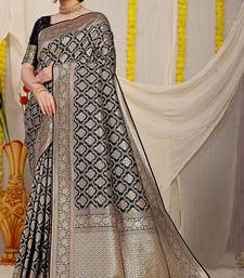 Black woven banarasi silk blend saree with blouse piece