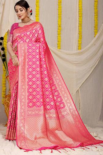 Rani pink woven banarasi silk blend saree with blouse piece