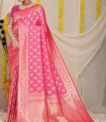 Rani pink woven banarasi silk blend saree with blouse piece