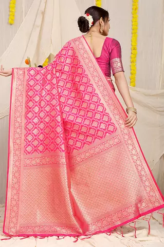 Rani pink woven banarasi silk blend saree with blouse piece