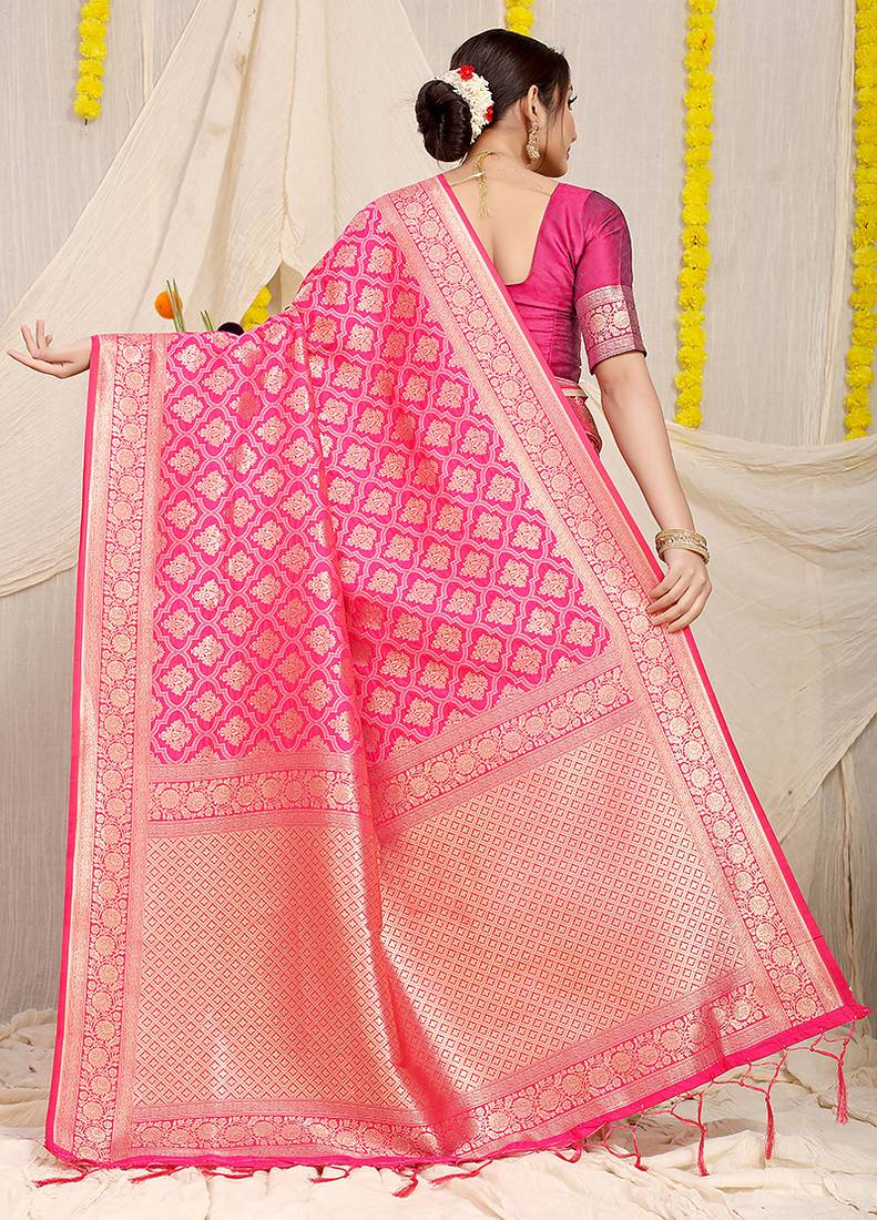 Rani pink woven banarasi silk blend saree with blouse piece