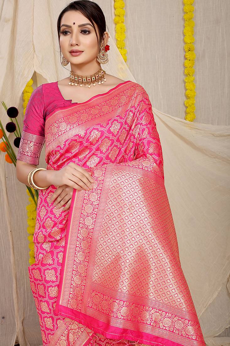 Rani pink woven banarasi silk blend saree with blouse piece