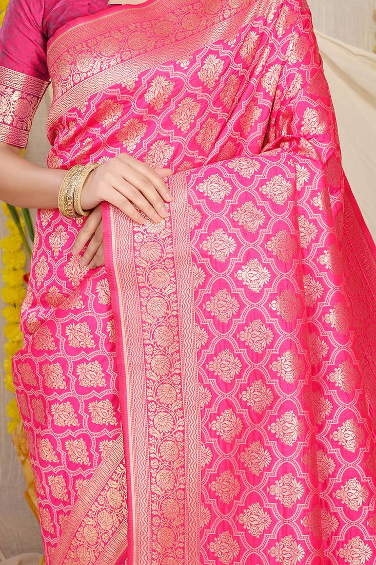 Rani pink woven banarasi silk blend saree with blouse piece