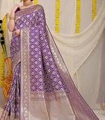 Purple woven banarasi silk blend saree with blouse piece