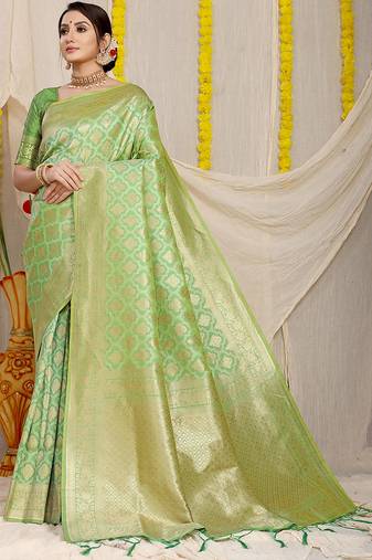 Light green woven banarasi silk blend saree with blouse piece