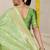 Light green woven banarasi silk blend saree with blouse piece