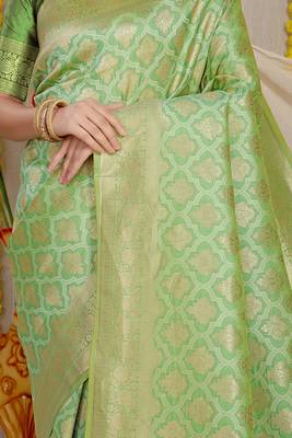 Light green woven banarasi silk blend saree with blouse piece 4