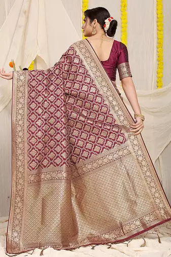 Wine woven banarasi silk blend saree with blouse piece