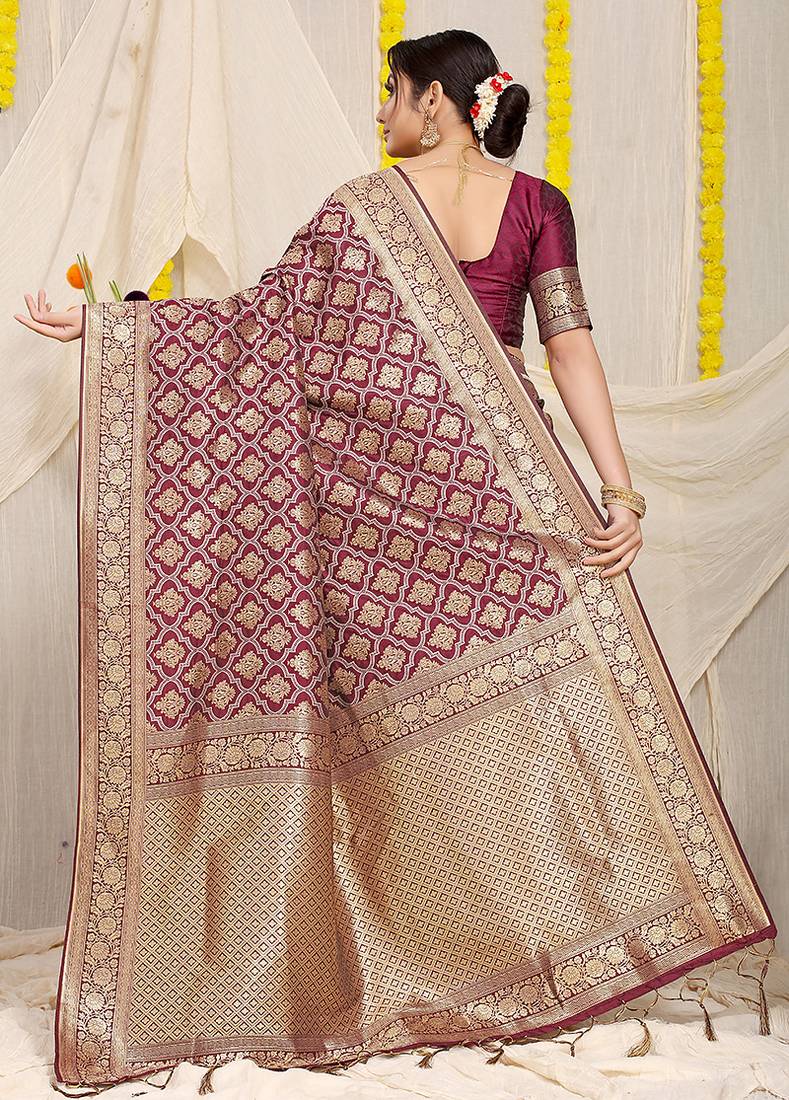 Wine woven banarasi silk blend saree with blouse piece