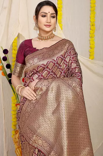 Wine woven banarasi silk blend saree with blouse piece