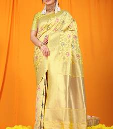 Light yellow banarasi silk blend saree with all-over floral jaal
