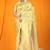 Light yellow banarasi silk blend saree with all-over floral jaal