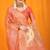 Peach orange banarasi silk blend saree with all-over floral jaal