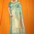 Turquoise banarasi silk blend saree with all-over floral jaal