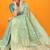 Turquoise banarasi silk blend saree with all-over floral jaal