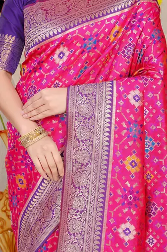 Rani pink patola silk blend zari woven saree with blouse piece