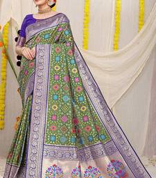 Olive green patola silk blend zari woven saree with blouse piece