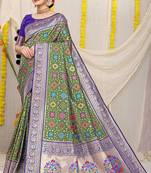 Olive green patola silk blend zari woven saree with blouse piece