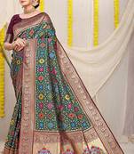 Bottle green patola silk blend zari woven saree with blouse piece