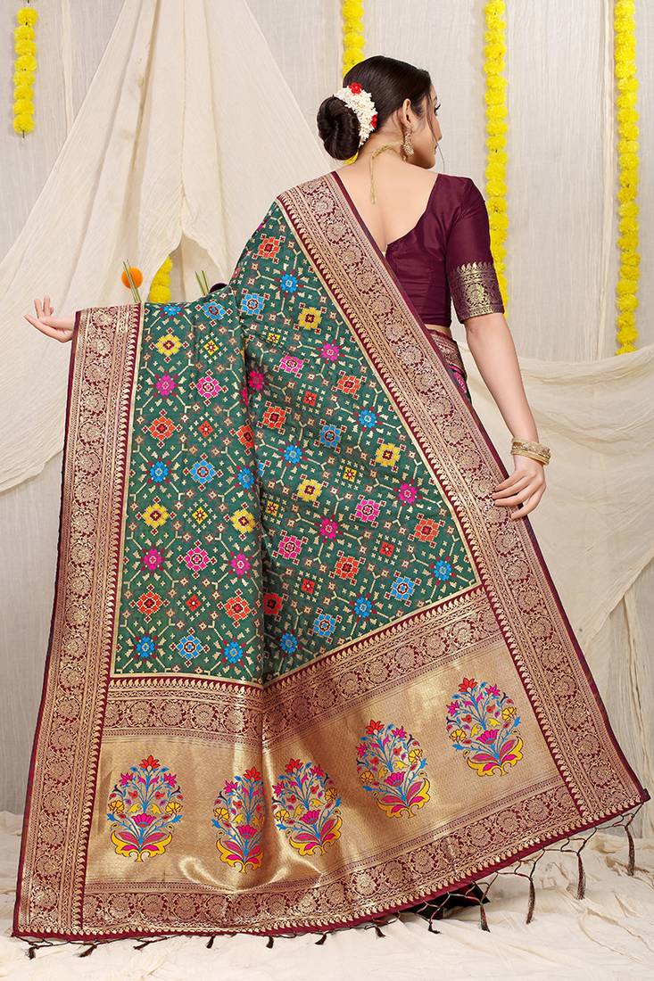 Bottle green patola silk blend zari woven saree with blouse piece