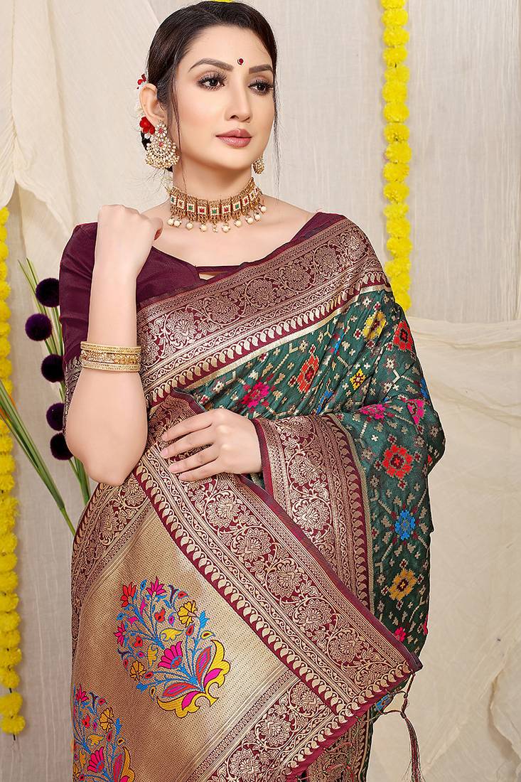 Bottle green patola silk blend zari woven saree with blouse piece
