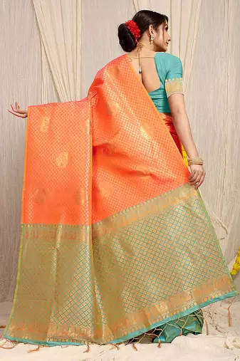 Orange kanjivaram silk blend zari woven saree with turquoise zari border