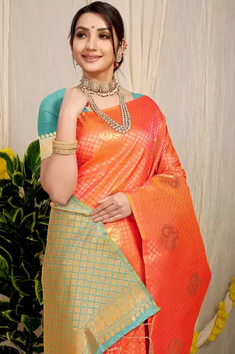 Orange kanjivaram silk blend zari woven saree with turquoise zari border