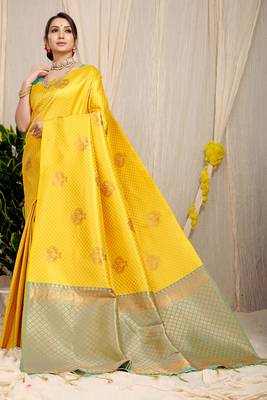 Yellow kanjivaram silk blend zari woven saree with turquoise zari border 1
