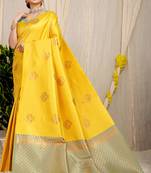 Yellow kanjivaram silk blend zari woven saree with turquoise zari border