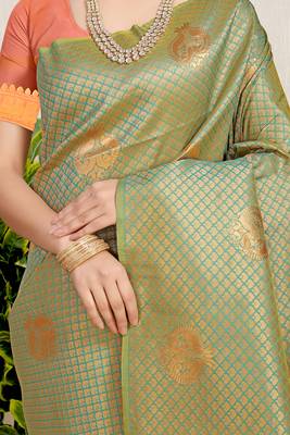 Olive green kanjivaram silk blend zari woven saree with orange zari border 4