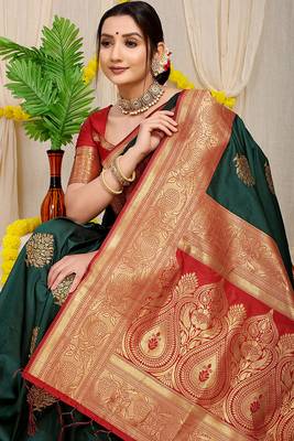 Bottle green silk blend kanjivaram saree with red zari border 2