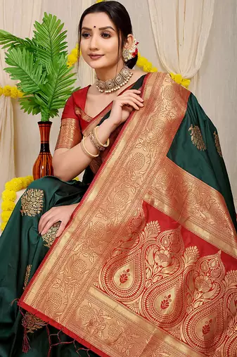 Bottle green silk blend kanjivaram saree with red zari border
