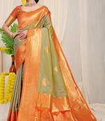Light olive green silk blend kanjivaram saree with orange zari border