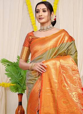 Light olive green silk blend kanjivaram saree with orange zari border 2