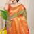 Light olive green silk blend kanjivaram saree with orange zari border